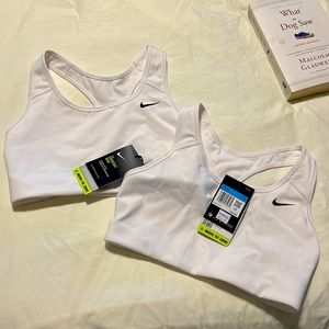 Nike sport bras no pad with tag size M. Price is for each.